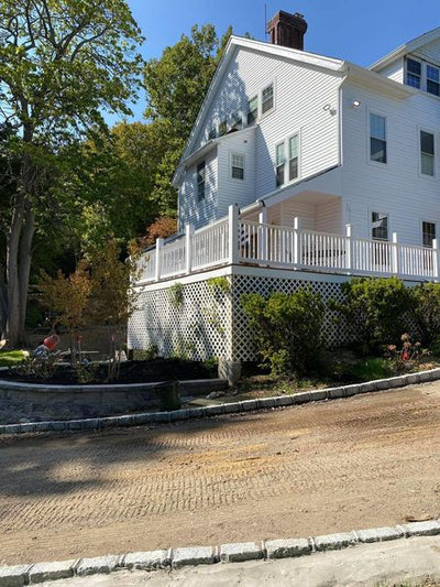 before and after shot of the corner of the house.