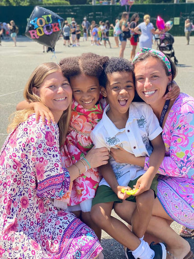 This is a picture of Fitz and Fallon with their kindergarten teachers on the last day of school